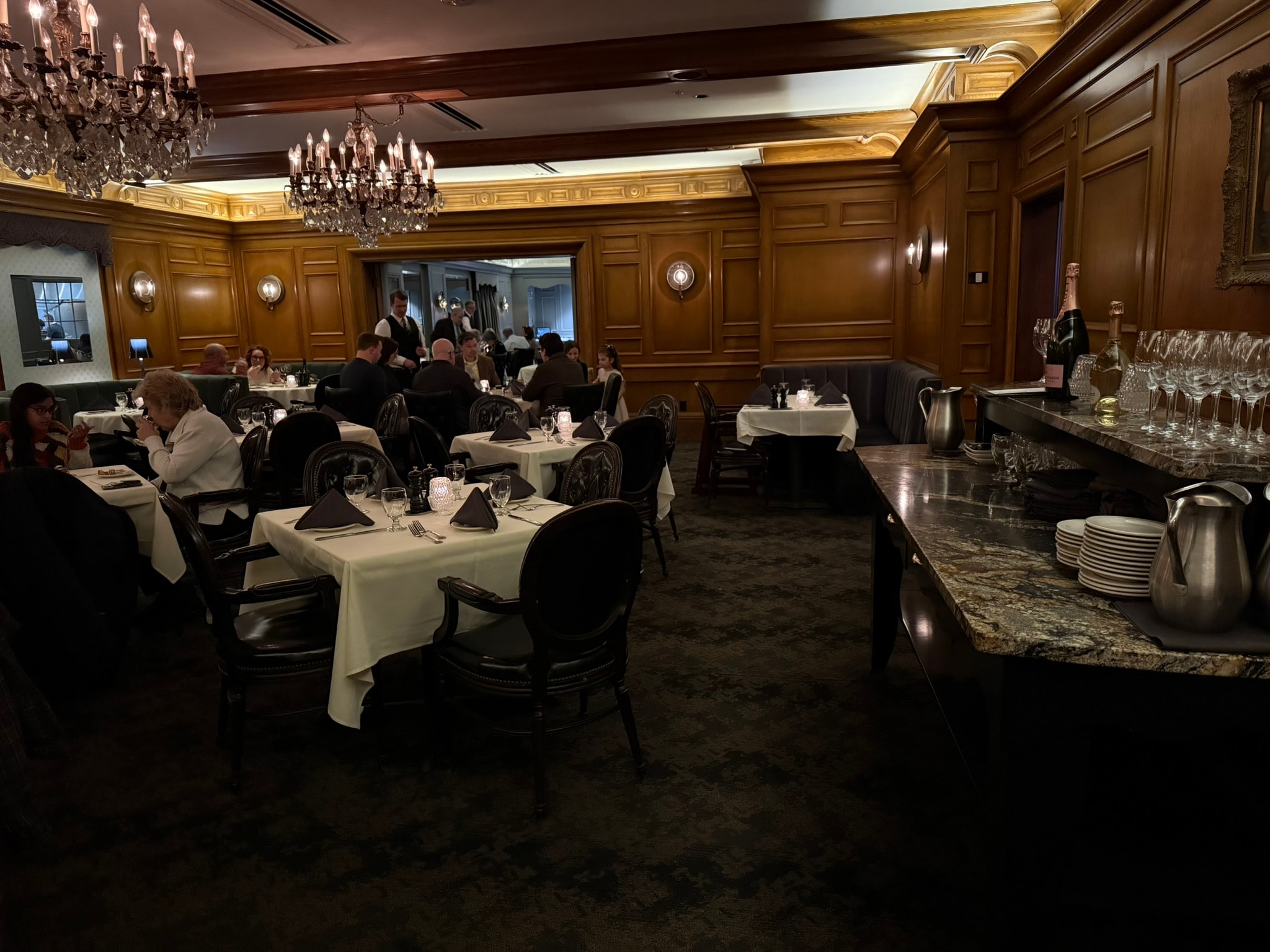 The Lexington bar and lounge at full service with guests