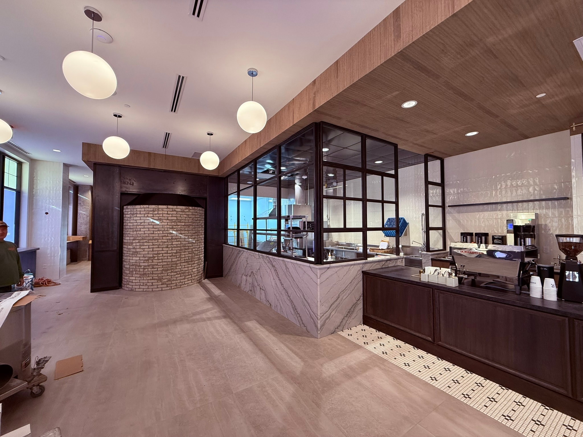 Interior view of the service counter and bread shelving wall
